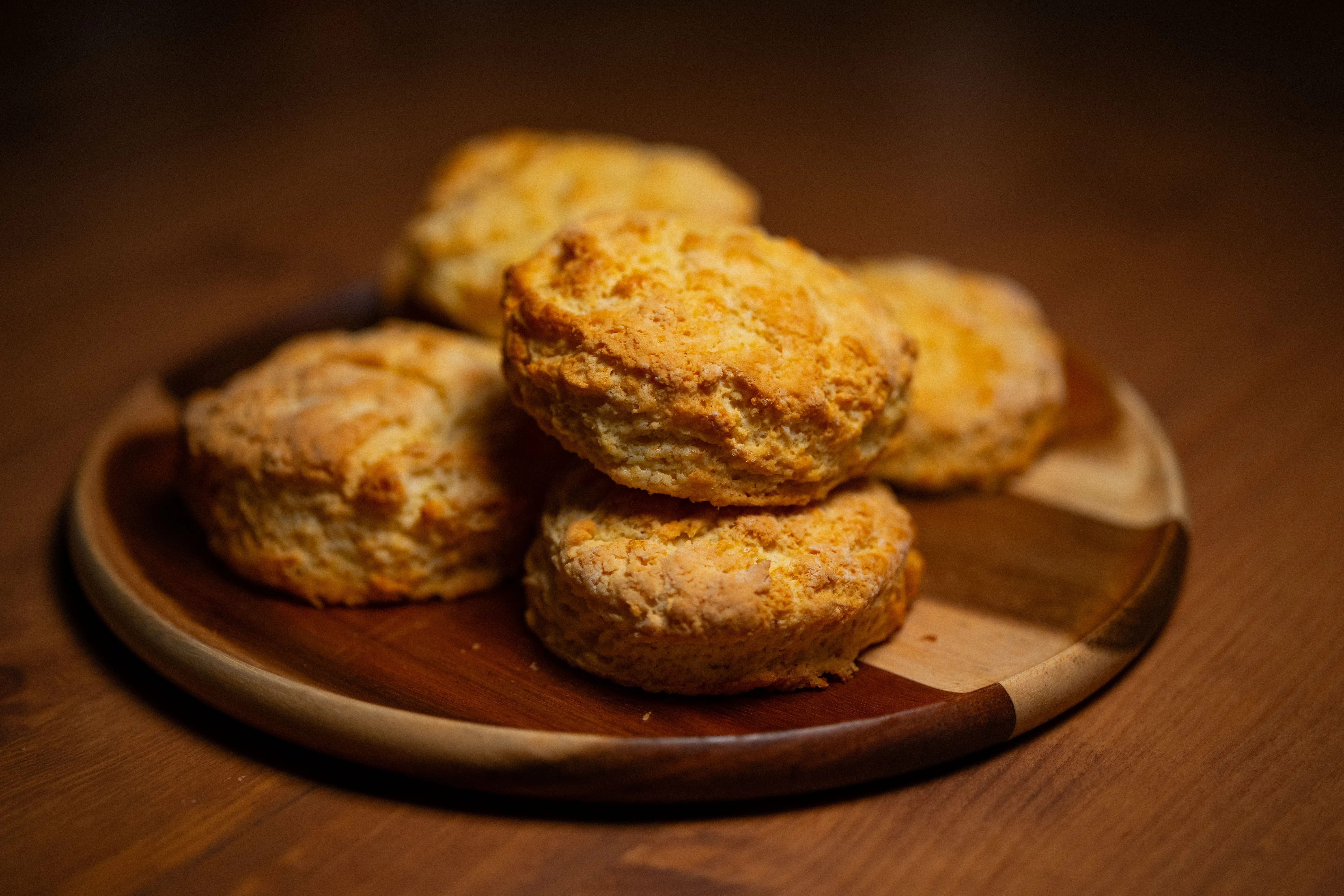 Cheddar Bay Biscuits on a wooden serving board